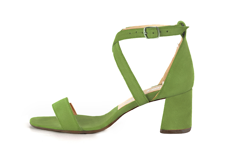 Women's  elegant sandals closed at the back with crossed straps. .  - Profile view